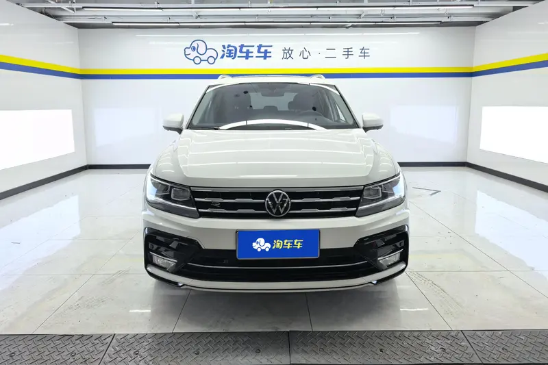 Volkswagen Tiguan L — фото 2