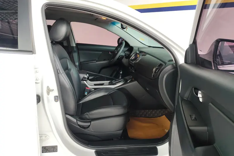 Kia Sportage — фото 12
