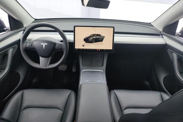 Tesla Model Y 2024 — фото 13